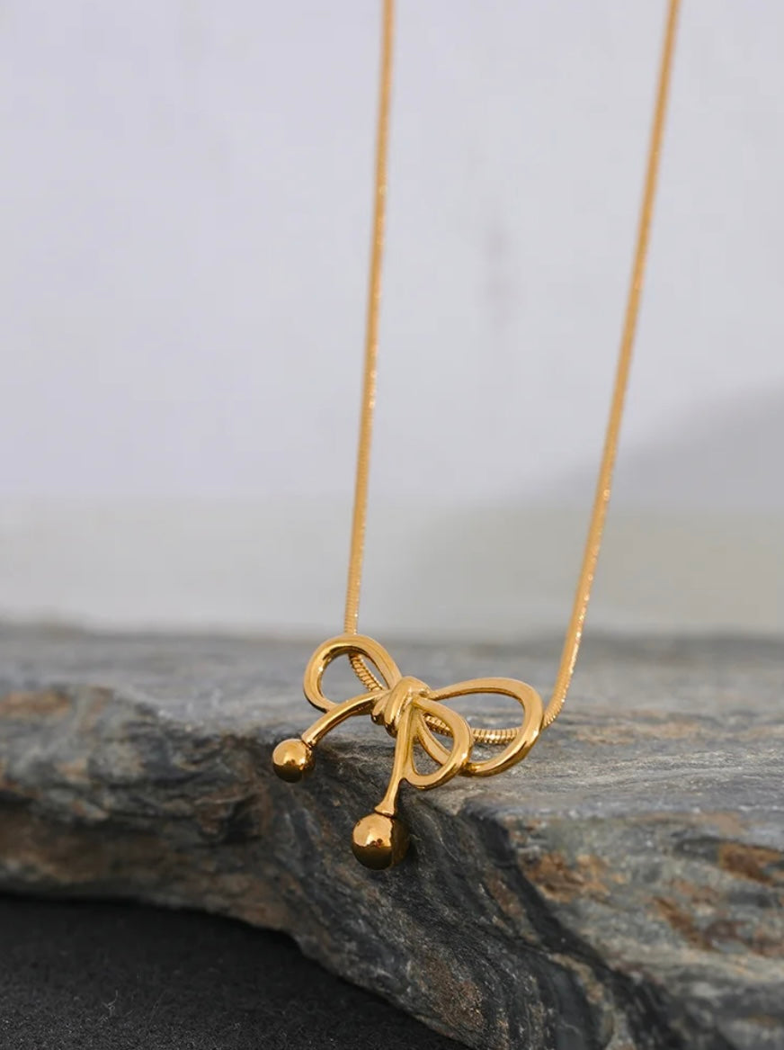 Bow-knot pendant necklace