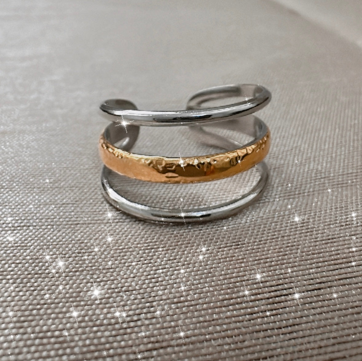 Hollow three layer open ring