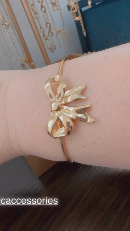 Bow cuff bracelet.